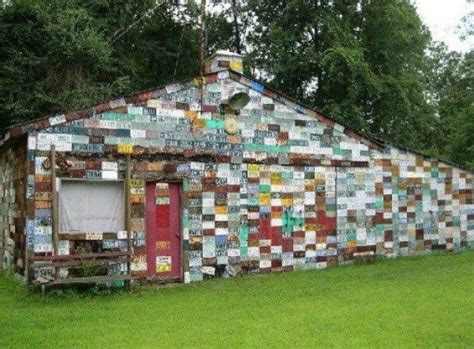 house made in a scrap metal workshop|houses made from recycled materials.